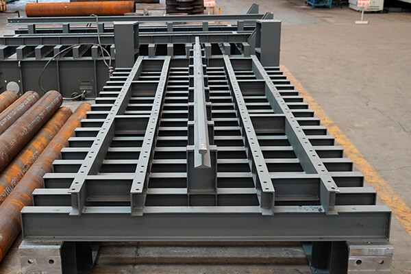 apron feeder impact rail