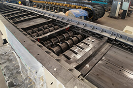 how-does-the-chain-conveyor-in-a-feeder-breaker-function